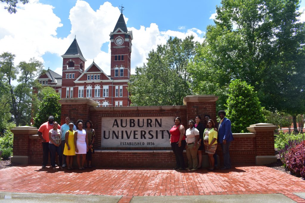 McNair Scholars in front of the Auburn University sign